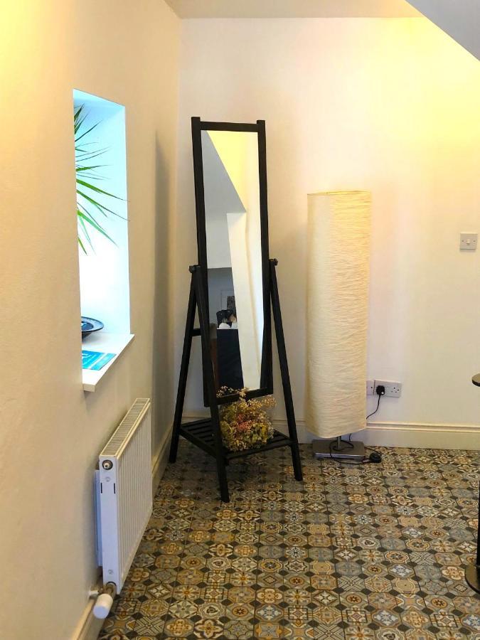 Dingle Garden Townhouse Bed & Breakfast Exterior photo A floor standing mirror