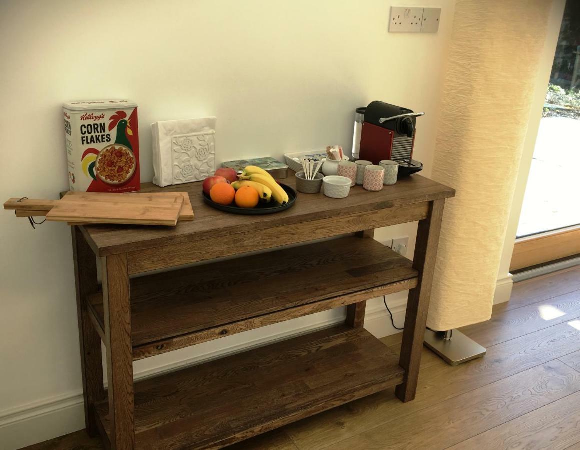 Dingle Garden Townhouse Bed & Breakfast Exterior photo A coffee table with a coffee machine